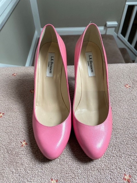 pink clutch bag and matching shoes